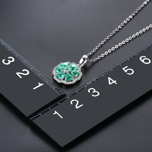 Circular Heart-Cut Emerald Pendant with Silver Frame and White Zircon Accent - Shop Now!