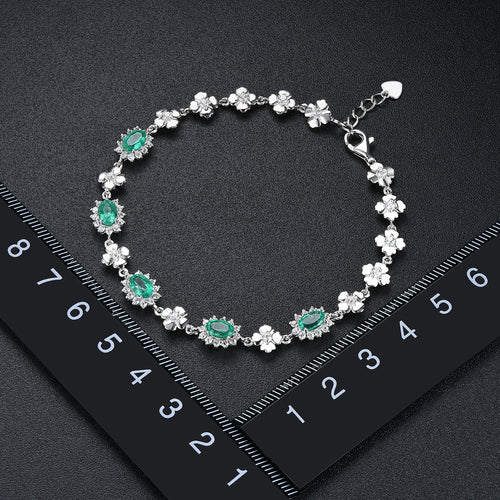 Adjustable Emerald Floral Gemstone Bracelet in Sterling Silver