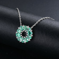 Circle of Grace Emerald & Zirconia Pendant