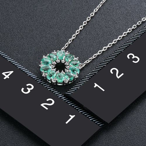 Circle of Grace Emerald & Zirconia Pendant