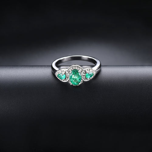 One oval and two pear shape Emerald Stones Ring