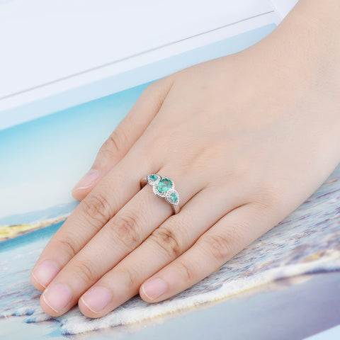 One oval and two pear shape Emerald Stones Ring.