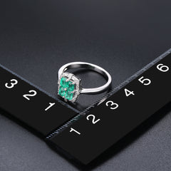 Four Emerald Stones form Emerald Shape Ring