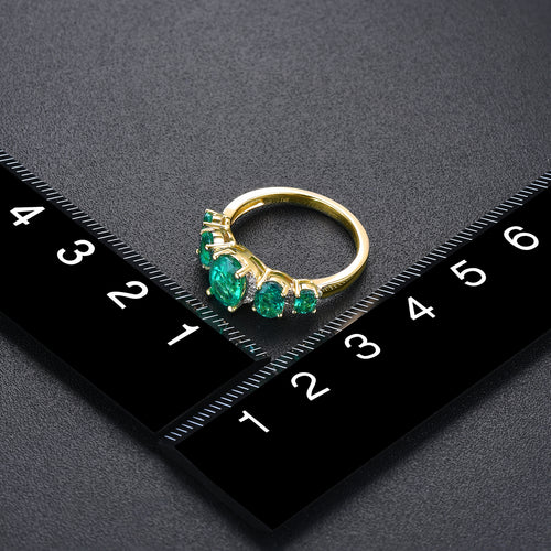 Oval Cut Emerald Ring with 14K Gold and Diamond