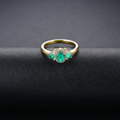 Three Stone Emerald and Gold Ring.