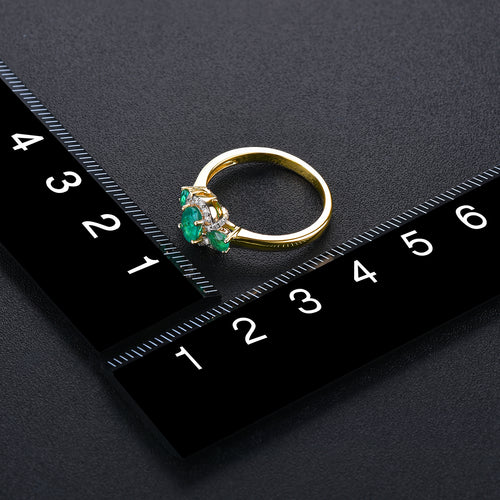 Three Stone Emerald and Gold Ring