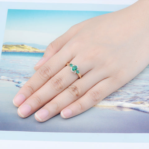 Three Stone Emerald and Gold Ring.