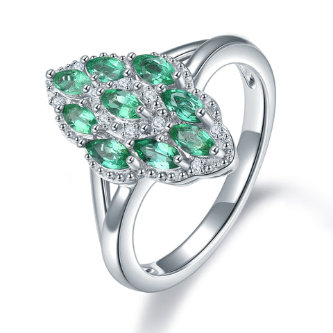 Sliver and Emerald Marquee Shape Ladies Ring.