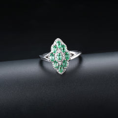 Sliver and Emerald Marquee Shape Ladies Ring.