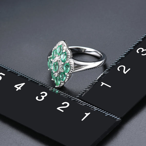 Sliver and Emerald Marquee Shape Ladies Ring.