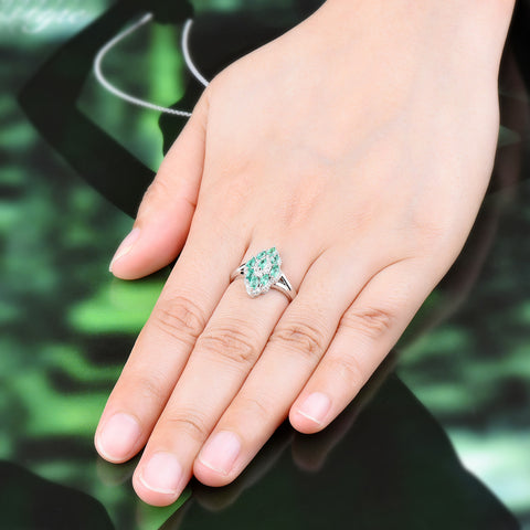 Sliver and Emerald Marquee Shape Ladies Ring.