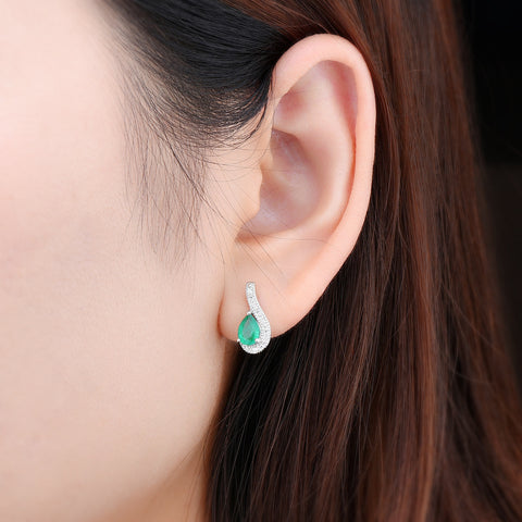 Pear Shape Emerald and Silver Drop Earrings.