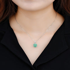 Flower Looking Emerald and Diamond Pendant in Silver