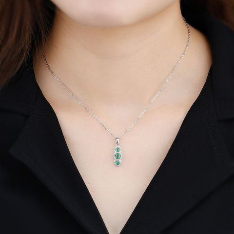 Three Emerald Stone and Diamond Pendant in Silver.