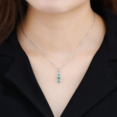 Three Emerald Stone and Diamond Pendant in Silver.