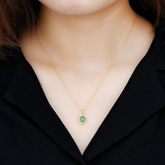 Oval Emerald and Diamond Pendant