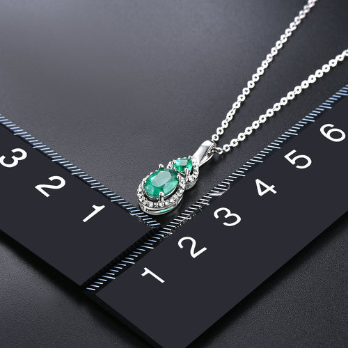Oval and Round stone Emerald Pendant in Silver