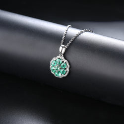 Circular Heart-Cut Emerald Pendant with Silver Frame and White Zircon Accent - Shop Now!