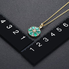 Gold Emerald and Diamond Necklace