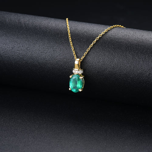 Gold Oval Emerald Pendant with Diamond